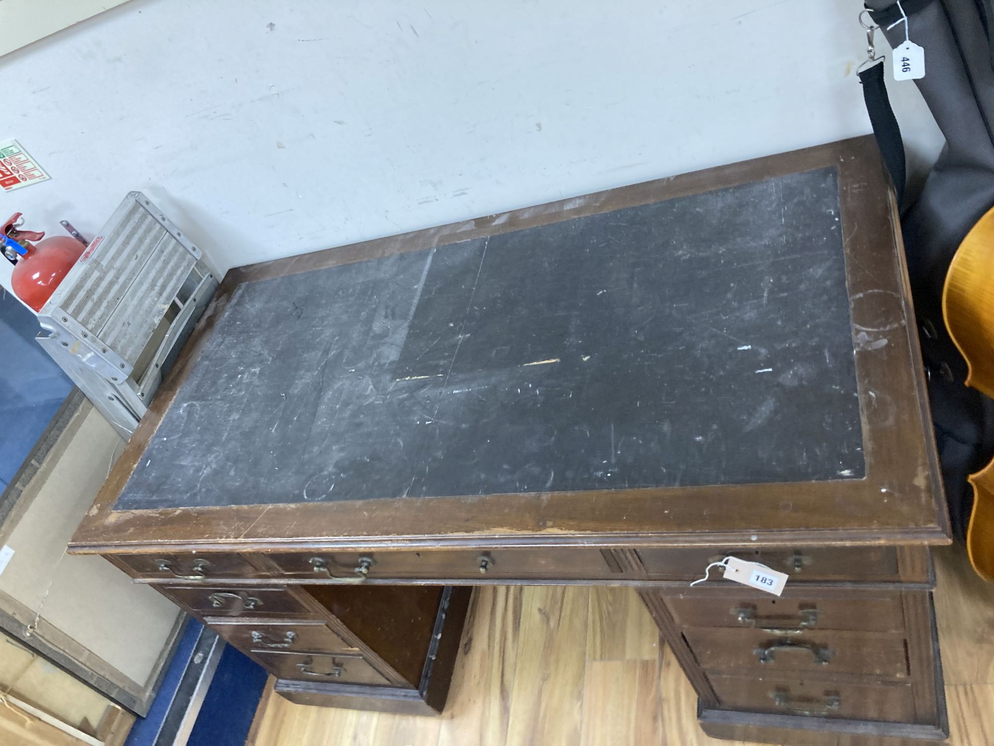 A late Victorian mahogany pedestal desk, length 132cm, depth 73cm, height 77cm